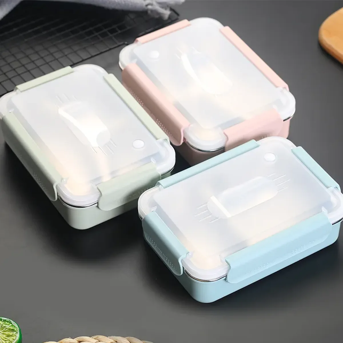 Three PP bento lunch boxes in green, pink and blue with translucent clip-on lids