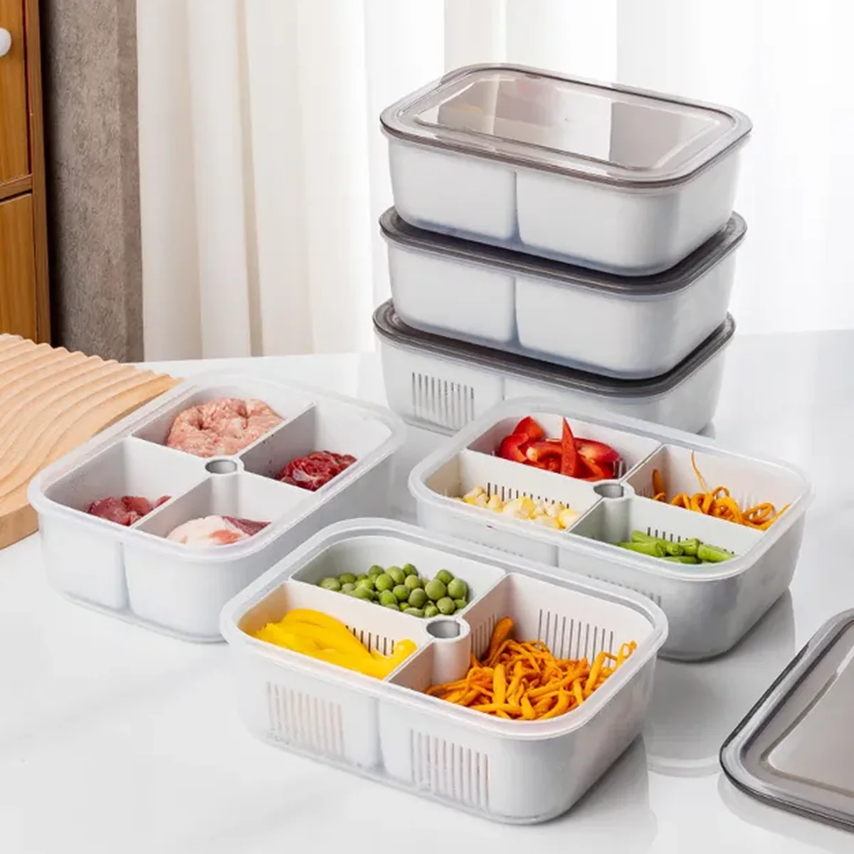 PP lunch boxes with flat snap-on lids, moulded dividers and a centre well in the base