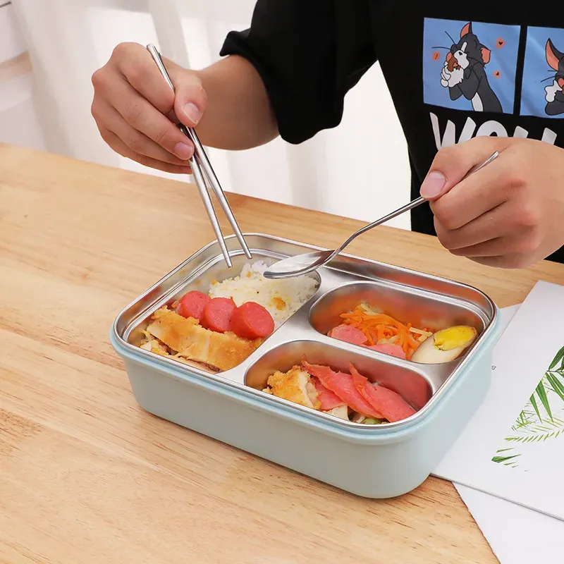 eating food in stainless steel lunch box